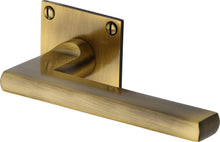 Load image into Gallery viewer, Heritage Brass Door Handle Lever Latch on Square Rose Trident Design