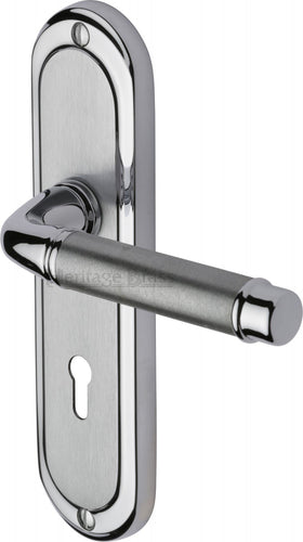 Heritage Brass Door Handle Lever Lock Saturn Design