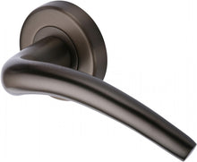 Load image into Gallery viewer, Heritage Brass Door Handle Lever Latch on Round Rose Wing Design