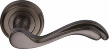 Load image into Gallery viewer, Heritage Brass Door Handle Lever Latch on Round Rose Lisboa Design
