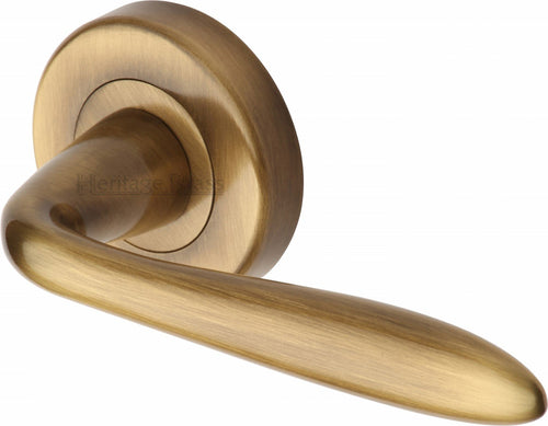 Heritage Brass Door Handle Lever Latch on Round Rose Sutton Design