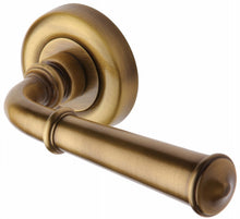 Load image into Gallery viewer, Heritage Brass Door Handle Lever Latch on Round Rose Colonial Design