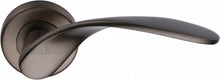 Load image into Gallery viewer, Heritage Brass Door Handle Lever Latch on Round Rose Volo Design