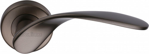 Heritage Brass Door Handle Lever Latch on Round Rose Volo Design