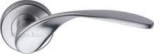 Load image into Gallery viewer, Heritage Brass Door Handle Lever Latch on Round Rose Volo Design