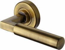 Load image into Gallery viewer, Heritage Brass Door Handle Lever on Rose Bauhaus Design